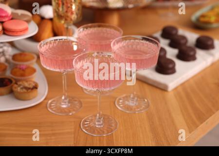 Buffet menu. Delicious desserts and drinks on table, selective focus Stock Photo