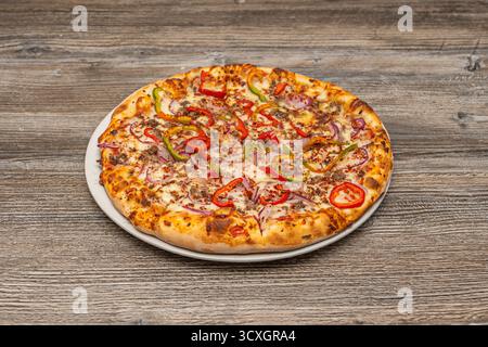 Grilled vegetable pizza with Charcoal-grilled zucchini, eggplant, red pepper, and onion Stock Photo
