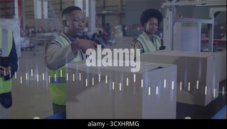 Worker scanning box on conveyor belt in warehouse Stock Photo - Alamy