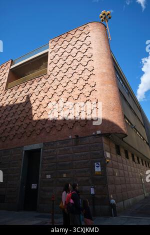 The curved, intricate, woven brick design of the Teatro Regio di Torino. Design by Carlo Mollino. In Turin, Torino, Italy. Stock Photo