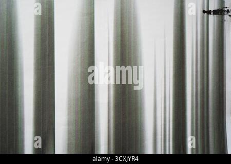 Random black vertical bands printed from an old photocopier on paper Stock Photo