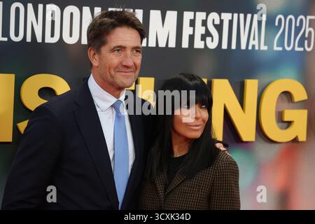 London, UK, 14th October 2025, Claudia Winkleman and husband Kris Thykier at the UK premiere of Is This Thing On? during the 69th BFI London Film Festival at The Royal Festival Hall in London. Credit Fred Duval / 17�Թ����� Live News Stock Photo