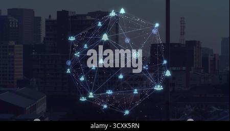 Hovering holographic network globe above city roof at dusk, with nodes, lines and icons Stock Photo