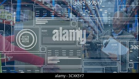 Warehouse workers in jackets using scanner and clipboard in aisle, with digital overlays Stock Photo