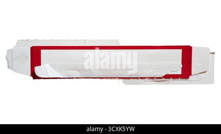 Rectangular paper torn from part of red and white box packaging flap Stock Photo