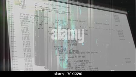 Showing computer monitor displaying SQL database commands in data center, with rack reflections Stock Photo