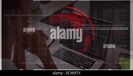 Scanning adult woman analyzing alphanumeric data on laptop at office desk, with red globe overlay Stock Photo