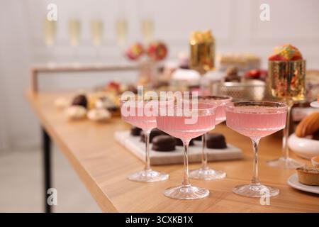 Buffet menu. Delicious desserts and drinks on table, selective focus Stock Photo
