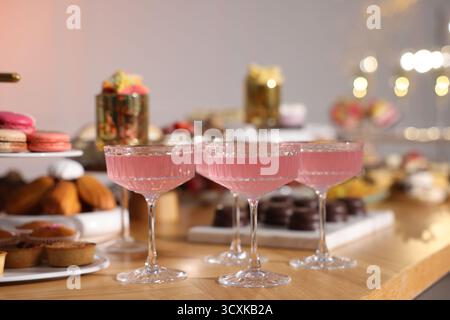 Buffet menu. Delicious desserts and drinks on table, selective focus Stock Photo