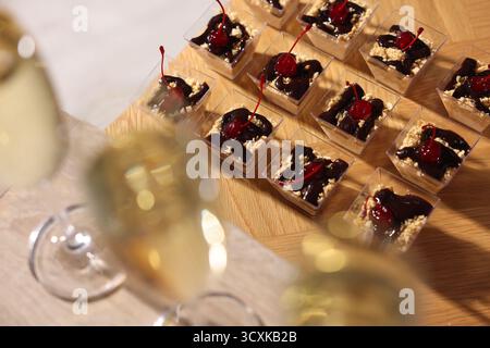 Buffet menu. Delicious desserts and drinks on table, selective focus Stock Photo