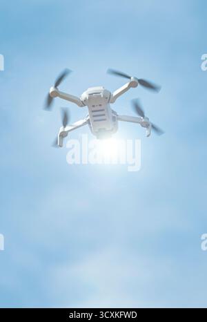 Drone on the Clouded Sky Stock Photo