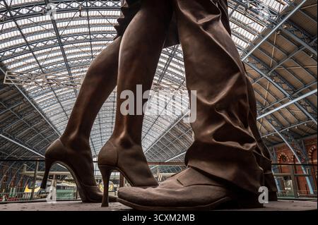 the meeting place statue at St Pancras station London England Stock Photo