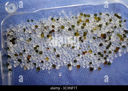Silica gel for moisture control, absorbent particles under a light ...
