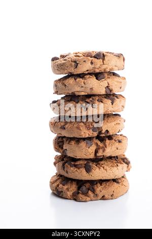 group of chocolate chip cookies stacked on a white background Stock Photo