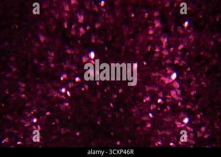 Colored light effects on dark background with grain and magic lights. Neon Glow Modern 90s, lo-fi Aesthetics. Design effect. Stock Photo