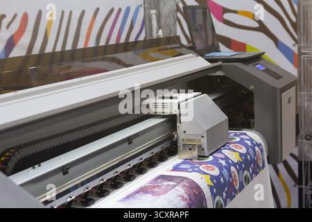 Large format printing machine in the printing house. Industry Stock Photo
