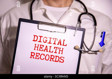 EHR Electronic Health Record text with Stethoscope on wooden background Stock Photo