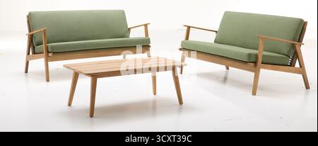 Long sofa set, wooden table  isolated nature background with clipping path Stock Photo