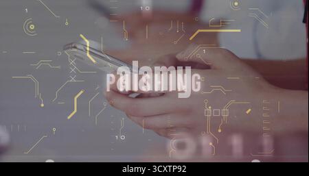 Showing hands holding phone on grey backdrop, with circuit binary overlays and phishing warning Stock Photo
