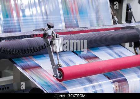 new innovative technology of automatic label printing machine with digital control panel. printing on continuous plastic film for wrapping on food pro Stock Photo