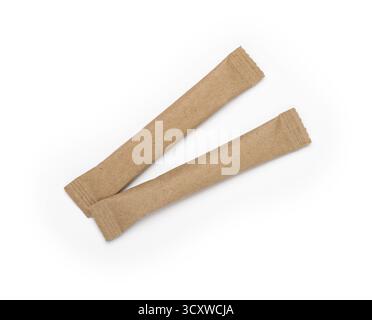 Two blank disposable paper sachet sticks for sugar, salt, pepper, coffee, tea or other similar dry product, isoolated on a white background, cut out, Stock Photo