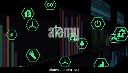 Displaying green hexagonal icons floating over dark control room dashboards, monitoring energy data Stock Photo