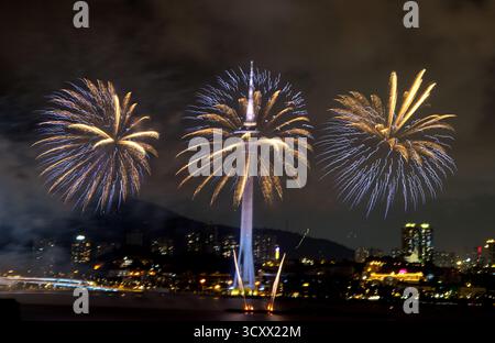 Capture the beauty and energy of the fireworks displays in a frozen pyrotechnic moment in Macau. Stock Photo