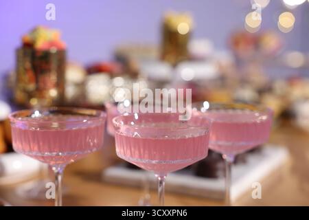 Buffet menu. Delicious desserts and drinks on table, selective focus Stock Photo