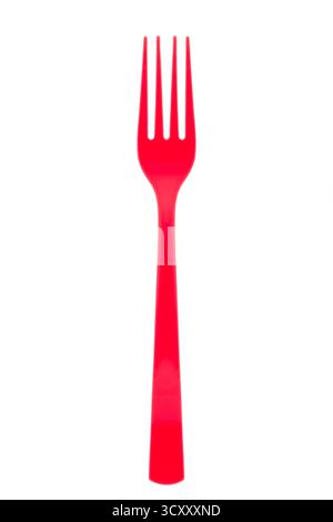 Red plastic fork on white background Stock Photo