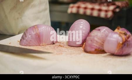 Expert Woman Chef Skillfully Prepares Fresh Homemade Pasta Dough in a Bustling Professional Kitchen Environment Stock Photo