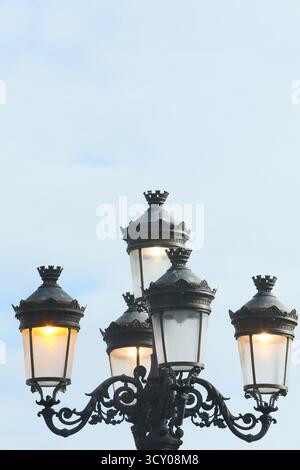Dublin, Ireland - 08th October 2025 - Lit traditional iron street lamps on O'Connell Bridge on a sunny afternoon in Dublin city depicting a street scene in the Irish capital Stock Photo