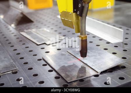 Arc welding robot. Example of working with a laser pointer. Industry Stock Photo