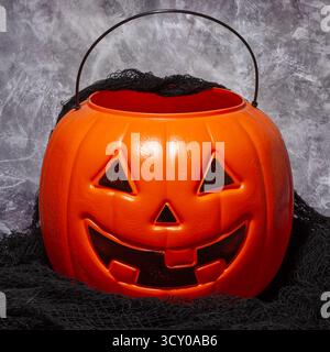 Jack-o-Lantern candy Halloween bucket with black cloth Stock Photo