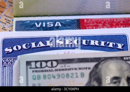 US Visa, Social Security Card and hundred dollar bills closeup macro Stock Photo
