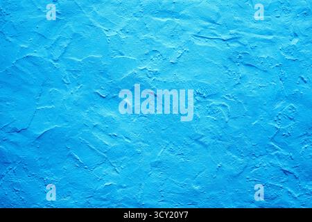 Rendered external house wall background backdrop, painted blue. Building technique concept. Stock Photo