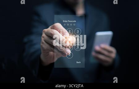 Close-up of man using virtual touchscreen keypad to unlock smartphone, concept of cybersecurity, secure access, digital data protection, and technolog Stock Photo