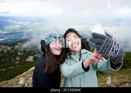 hiker friends taking selfie on Mount Untersberg Salzburg, Austria Stock Photo