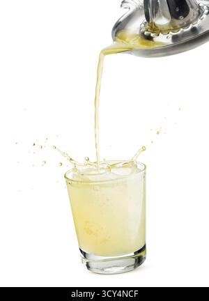 glass of lemonade with juice falling from juicer, isolated on white background. Stock Photo