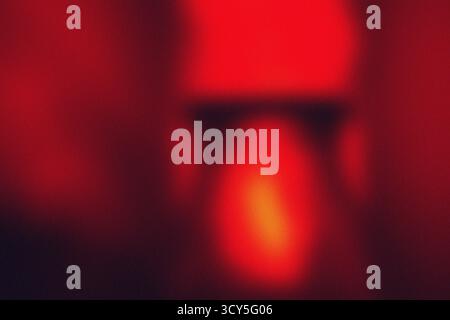 Red and orange grunge noisy texture. Blurred defocused gradient background design. Lo-fi effect Stock Photo
