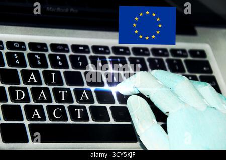Robot hand on keyboard showing "Ai Data Act" conceptual image for Artificial Intelligence Act in Europe. Stock Photo