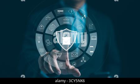Cybersecurity concept with digital icons. Businessman touch cyber security shield protection hologram, information safety, digital encryption privacy, Stock Photo