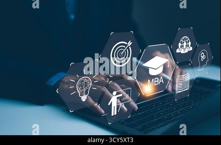 MBA Master of Business Administration Education concept. A person types on a laptop with virtual icons representing MBA education, Stock Photo