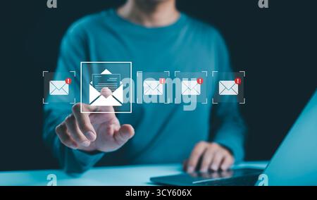 Email notification management concept. Checking digital email, A person with new email notification icons on a digital interface, email communication, Stock Photo