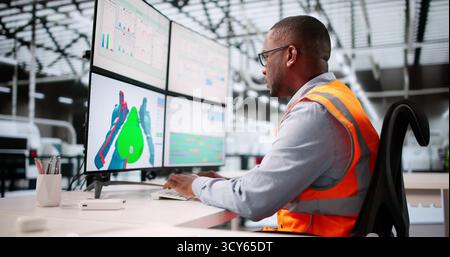 Mechanical Engineer Uses CAD Software To Design Product On Monitor. Stock Photo