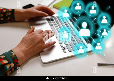 HR Human Resources management concept. eychar searches the internet for candidate resumes to create a team. HR team searching candidate policies Stock Photo