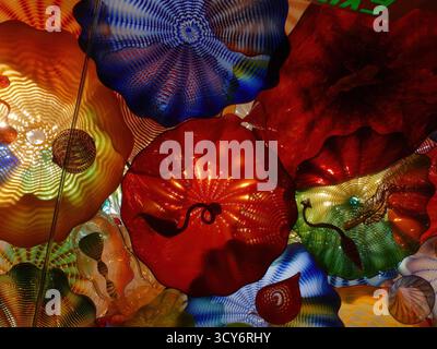 SEATTLE - APR 25, 2025 - Colorful blown glass sculptures suspended from the ceiling create a mesmerizing display of vibrant hues and organic forms, sh Stock Photo