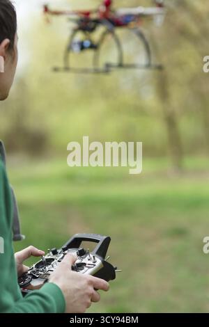 Man controling a drone Stock Photo