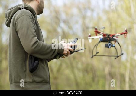 Man controling a drone Stock Photo