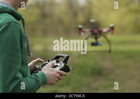 Man controling a drone Stock Photo