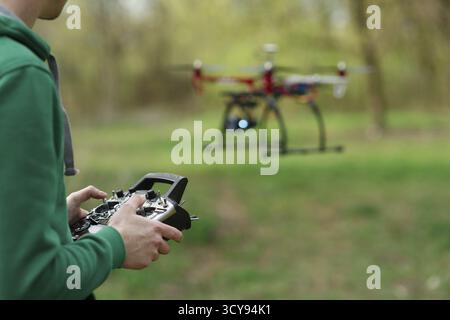 Man controling a drone Stock Photo
